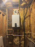 Tankless water heater install in basement utility space